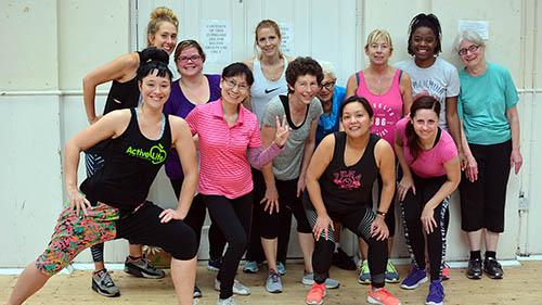 A group of women at the She's Ready project pose for a photo