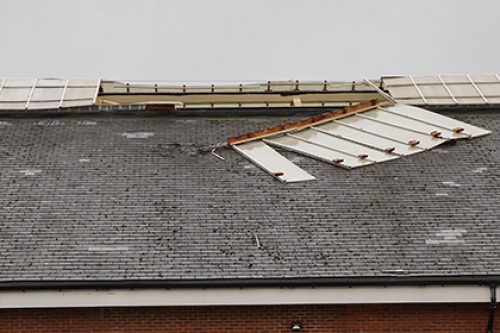 Part of the roof blown off a sports facility