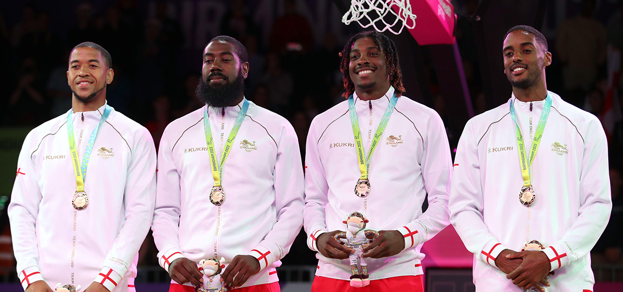 The Team England 3x3 basketball team with their gold medals at Birmingham 2022 Commonwealth Games
