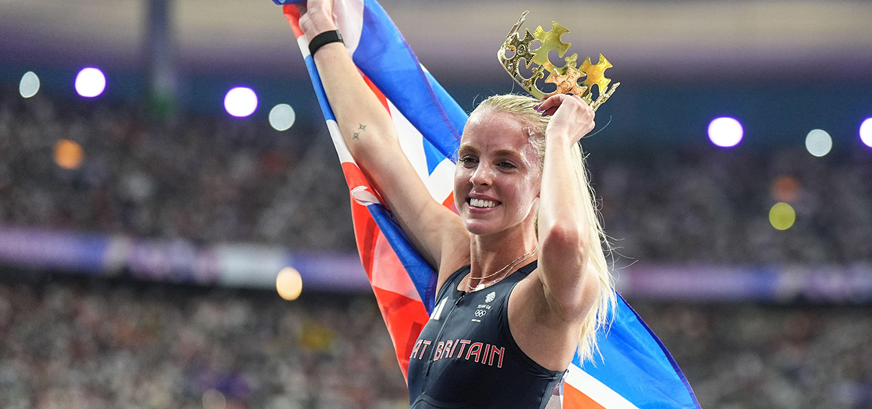 British Olympic champion Keely Hodgkinson celebrates her 800m victory at Paris 2024 with a Union flag and plastic crown