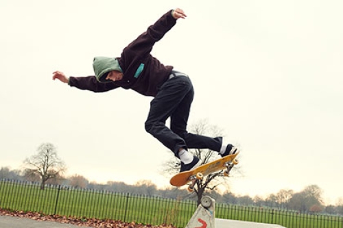 A man skateboarding in the park