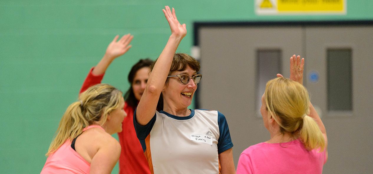 A group celebrate a great moment while playing sport