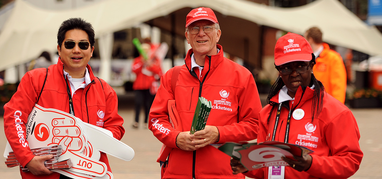 Volunteers help out at the cricket