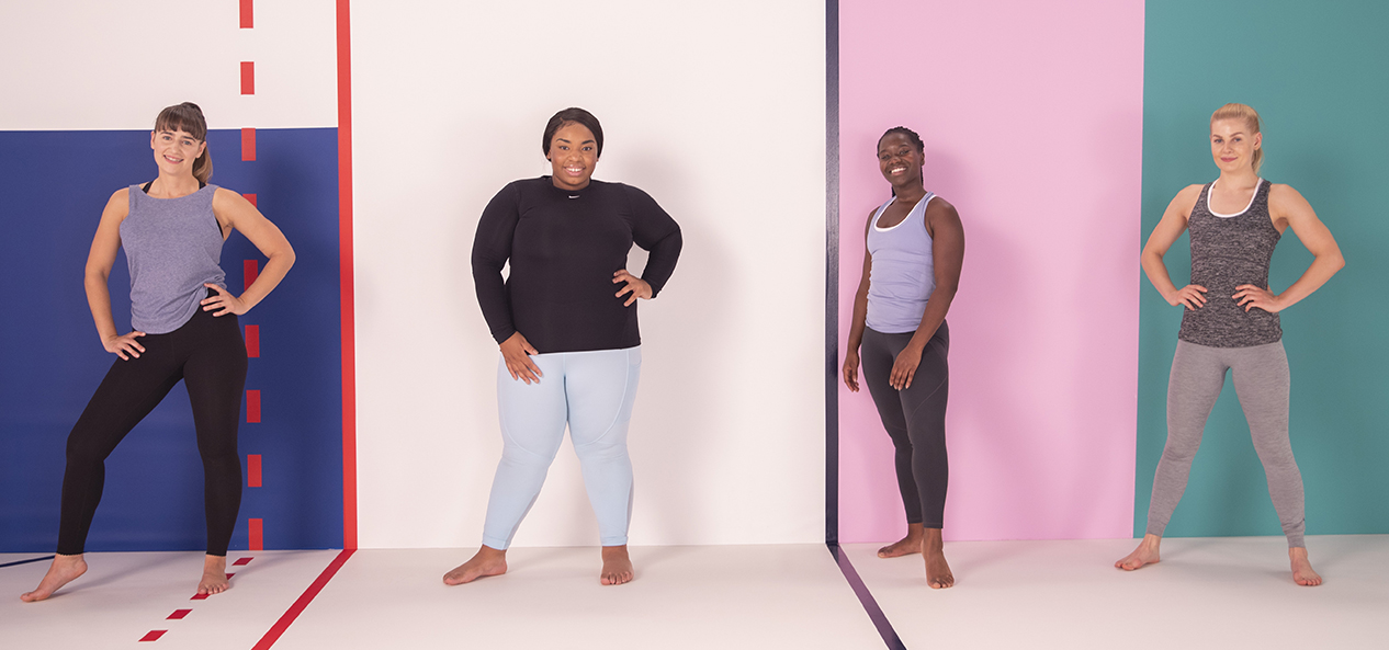 Four participants in the Studio You videos pose for a photo in the studio