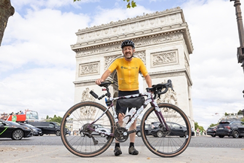 Sport England chair Chris Boardman poses with his bike in front of the Arc de Triomphe at the end of the Pedal for Paris ride,