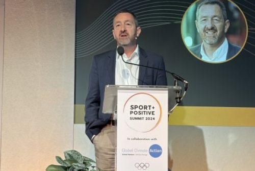 Chris Boardman speaks at a lectern during the Sport Positive summit.