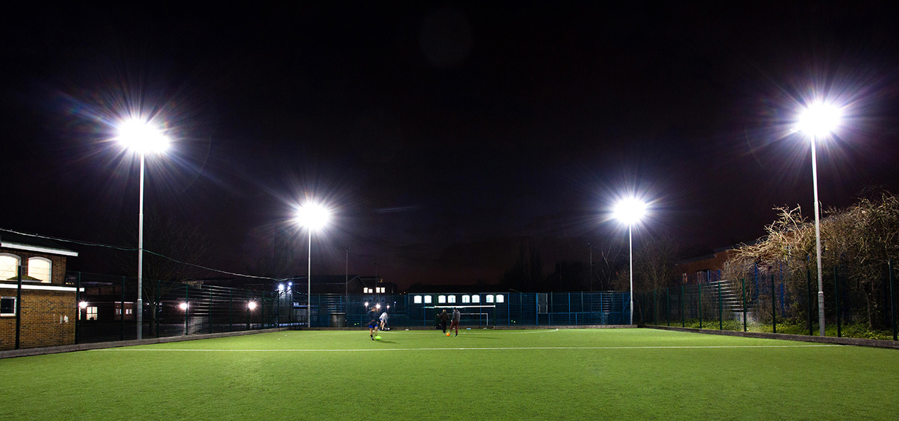 Floodlights on a 4G community football pitch