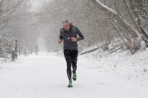 A man running in the snow