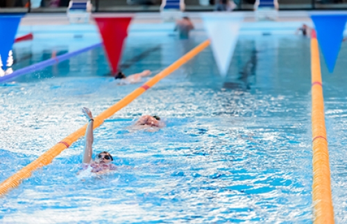Lane swimming at a public indoor swimming pool.