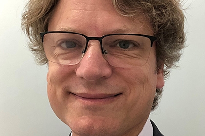 Headshot of Neil Tester, director of the Richmond Group of Charities