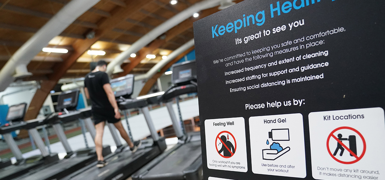 A gym in Manchester reopens with signs up on how to social distance and use equipment safely
