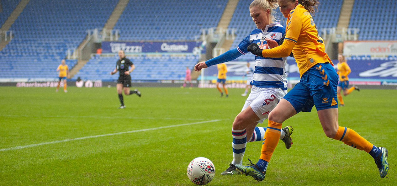An FA Women's Super League game between Reading and Everton, played in front of empty stands.