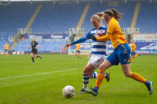 An FA Women's Super League game between Reading and Everton, played in front of empty stands.