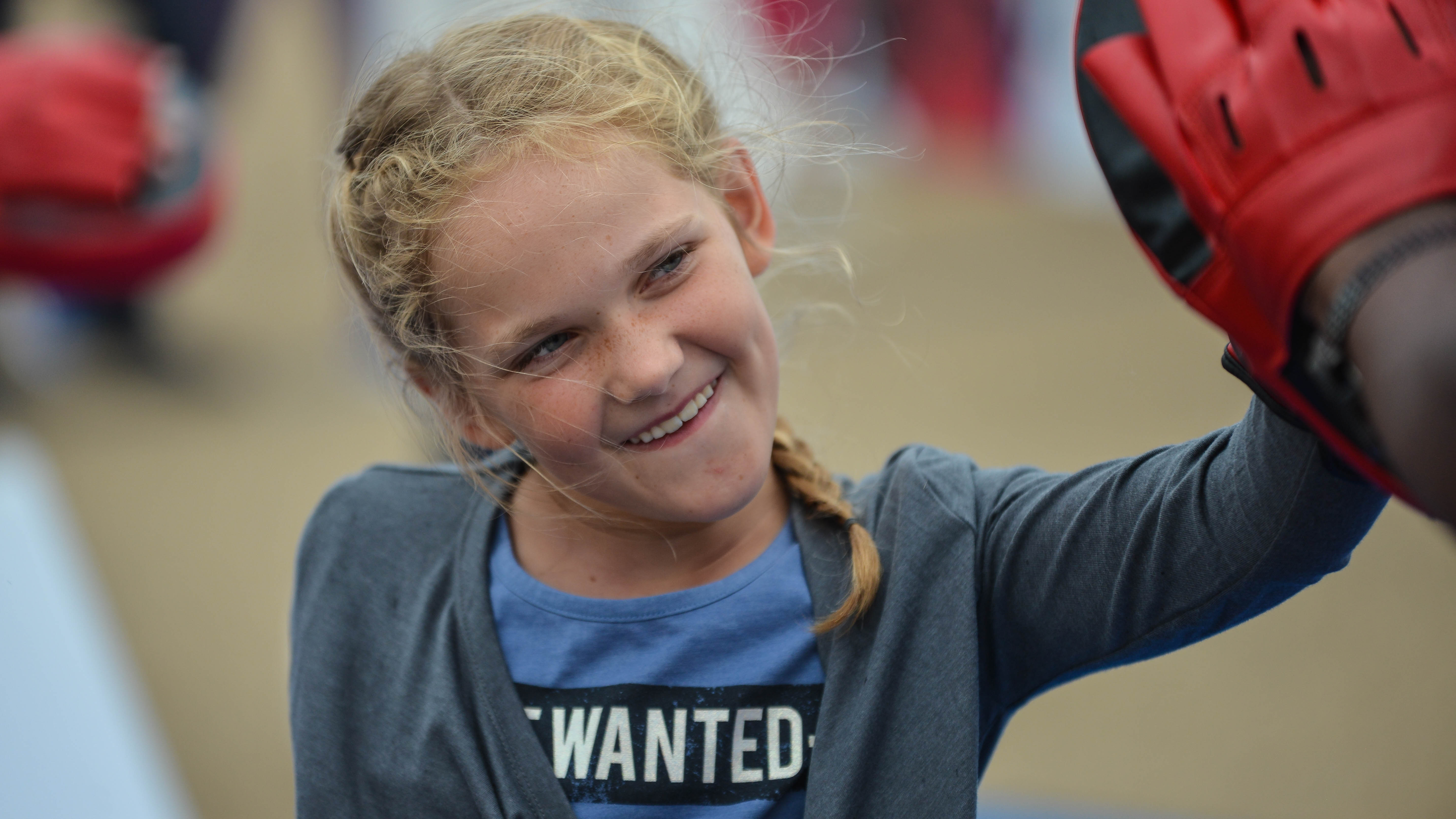 girl training with a boxing coach