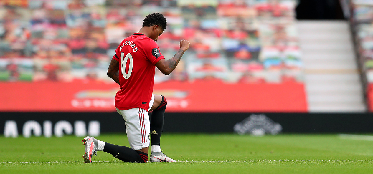 Marcus Rashford takes the knee to mark the Black Lives Matter movement during Manchester United's game with West Ham 