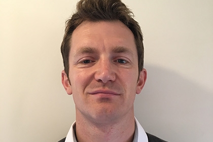 Headshot of Sport England's development manager for coaching, Sion Kitson