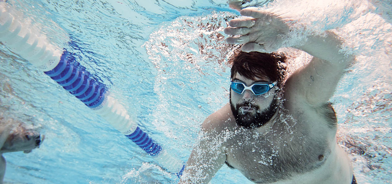 A man swimming in a pool