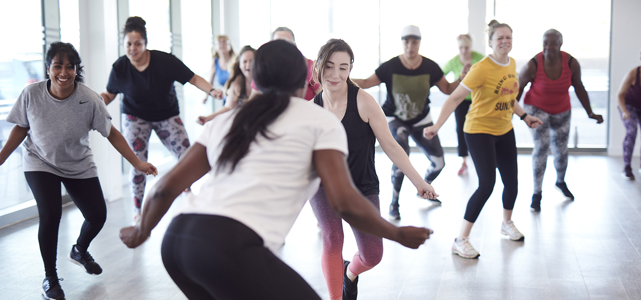 Women enjoying working out together at a This Girl Can fitness class