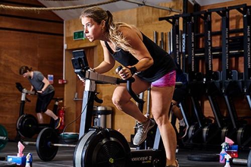 A woman on a bike at the gym