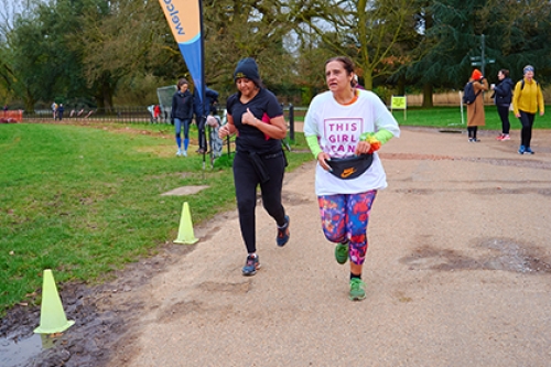 Two women, one wearing a This Girl Can t-shirt, take part in the first International Women's Day This Girl Can parkrun