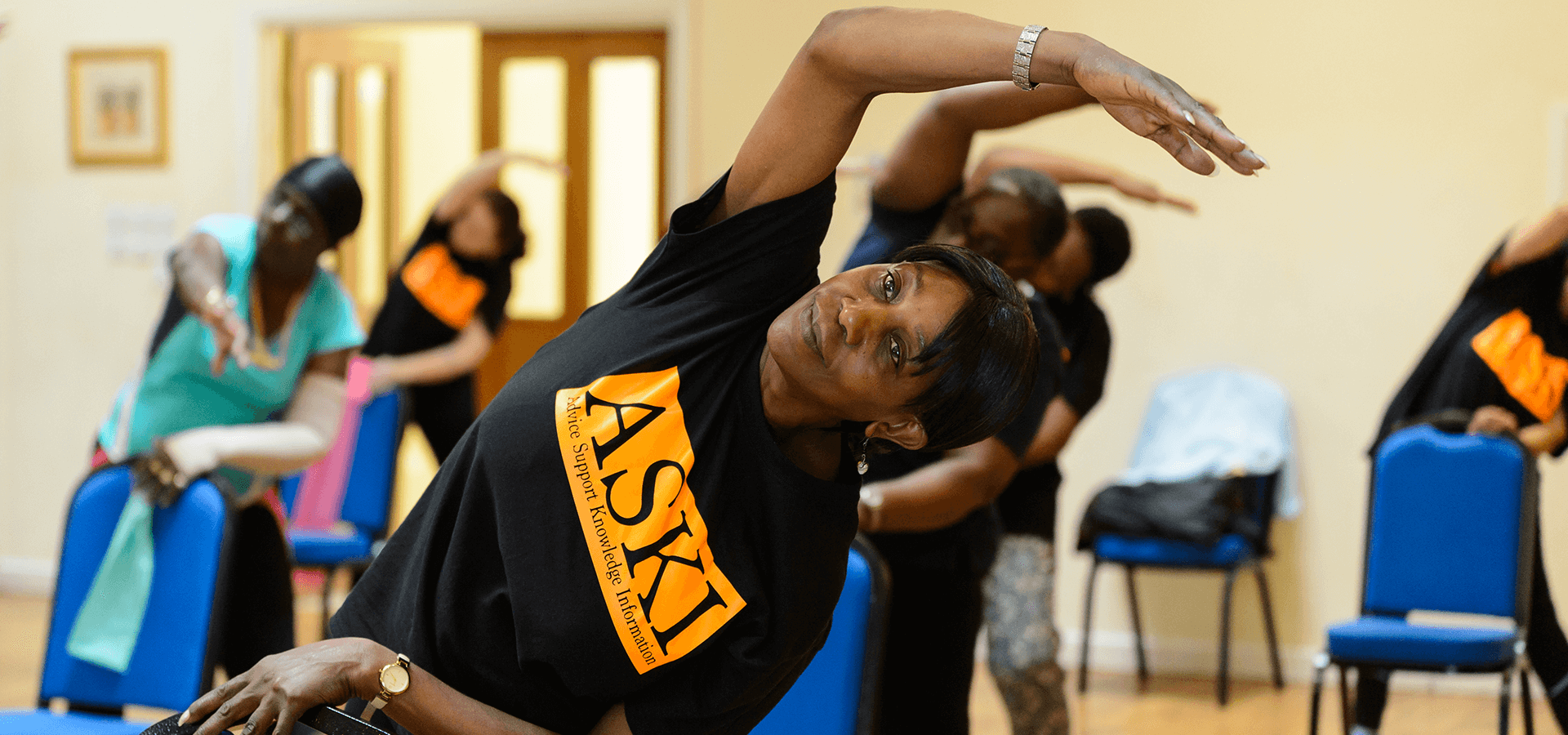 Woman stretching at exercise class