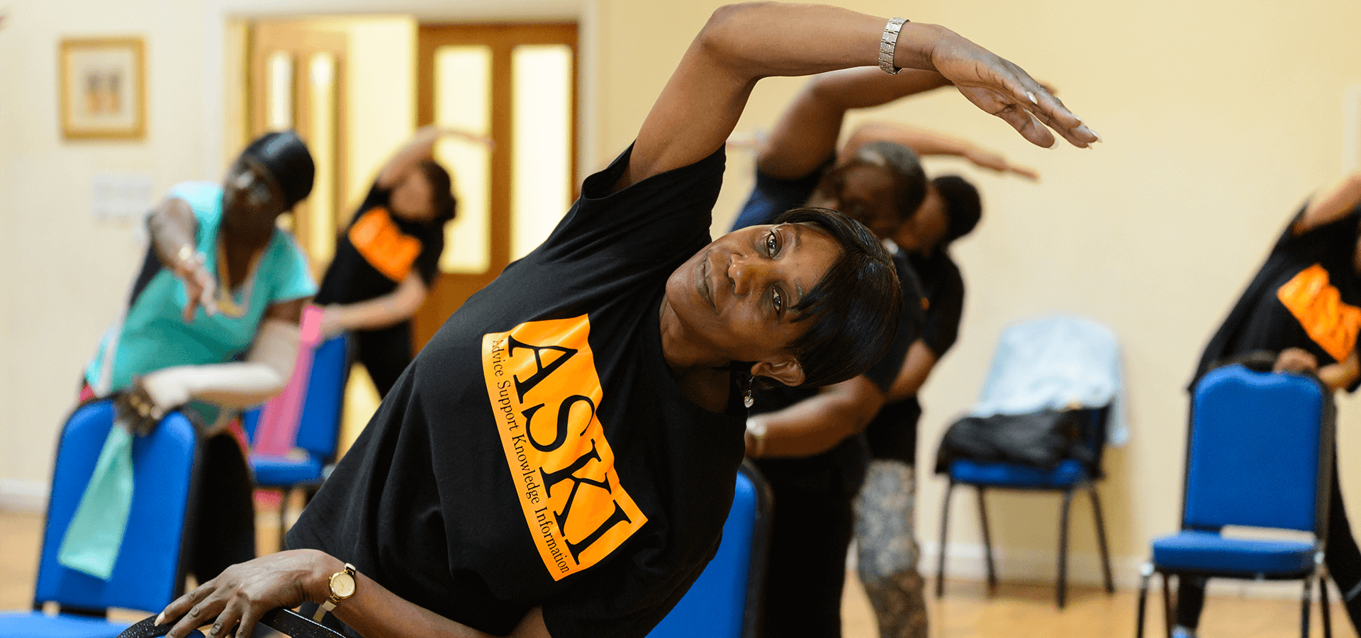 Woman stretching in group class