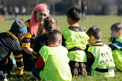 Rugby players have team huddle